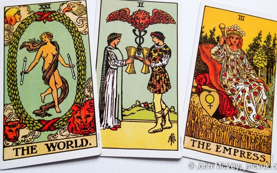 Three tarot cards depicting John's Oracle highlighted on a white background.
